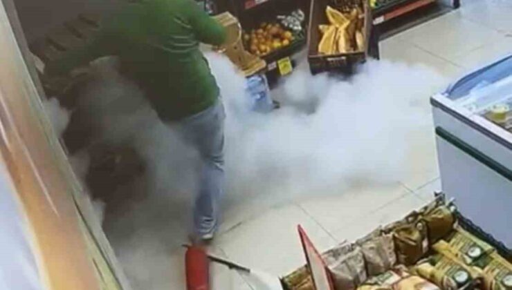 Markette ilginç anlar: Yangın tüpü yere düştü, çalışan panikle kaçtı
