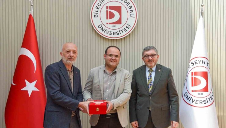 BŞEÜ’ye gümüş madalya ve madalya beratı takdimi